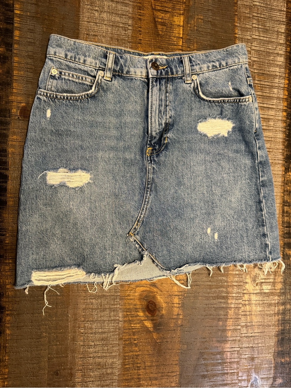 distressed medium-wash denim mini skirt from We The Free by Free People Size 28